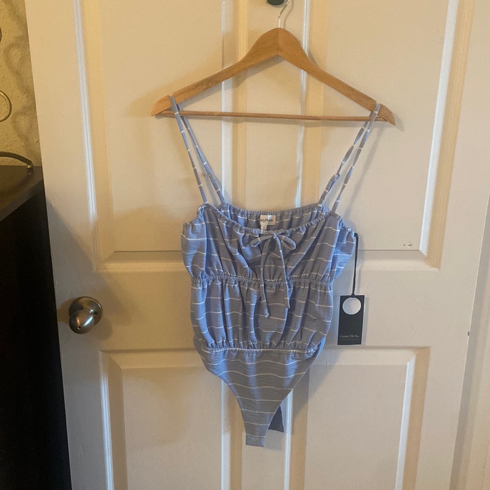 Light blue body suit